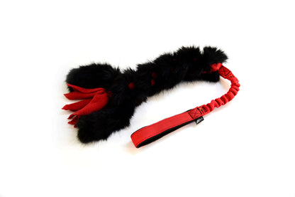 The damping toy of artificial fur for dogs