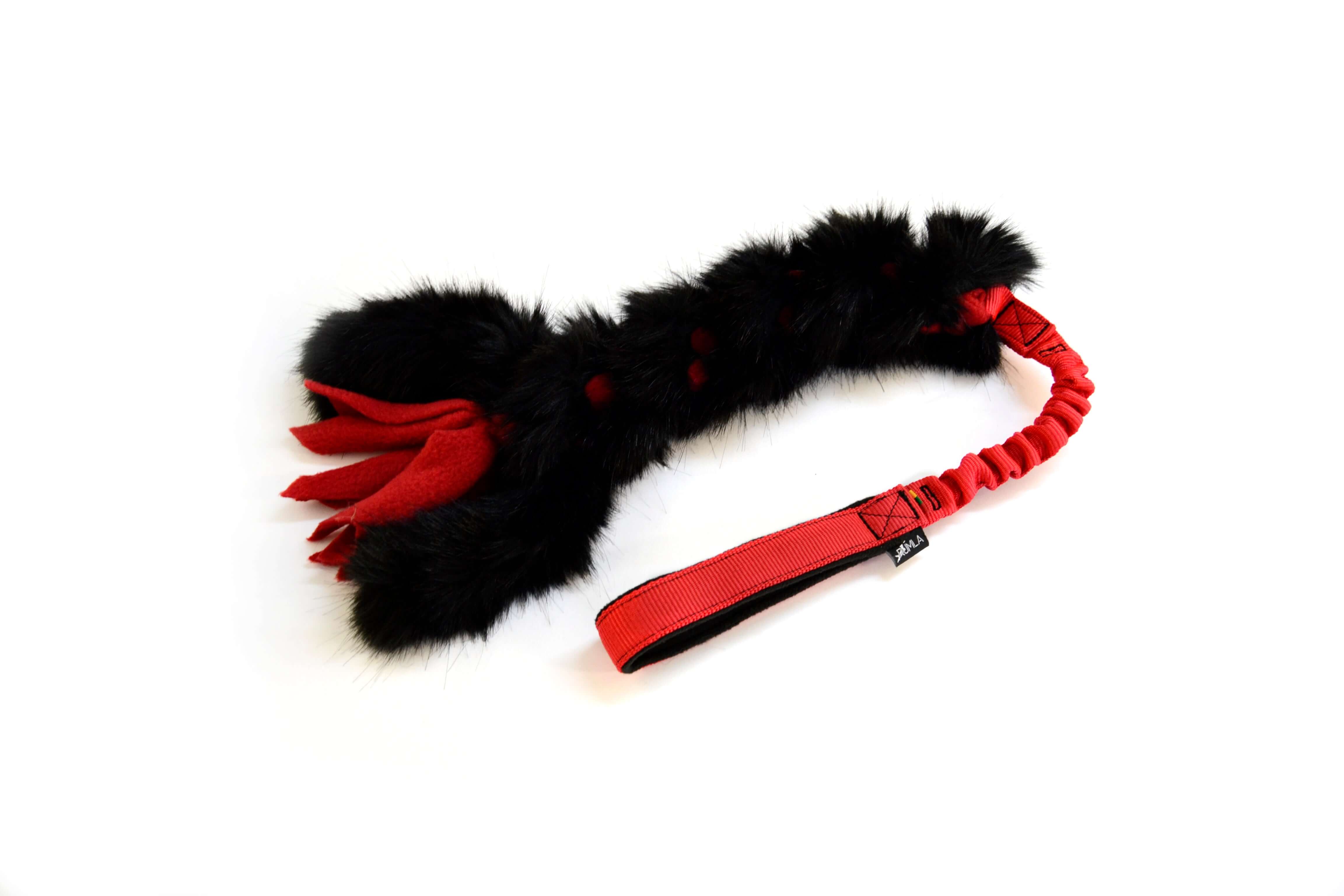 The damping toy of artificial fur for dogs
